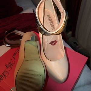 Pink and gold platform heels.